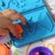 play dough cutters and stamps in child development