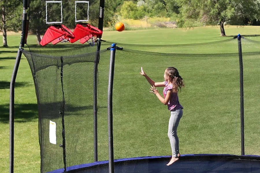 double the fun, half the yard space adding a basketball hoop to your trampoline